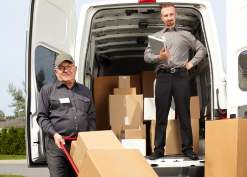 A team preparing boxes for a St Johns Wood home relocation