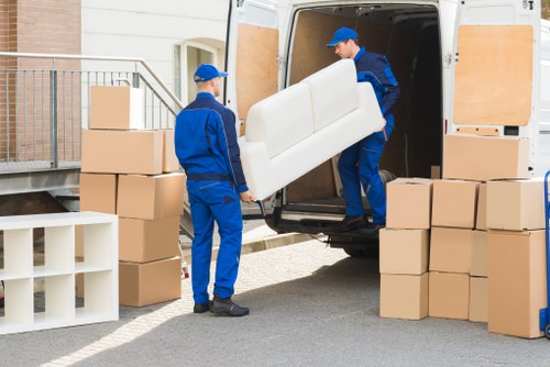 Man and van team loading items for a UK moving service
