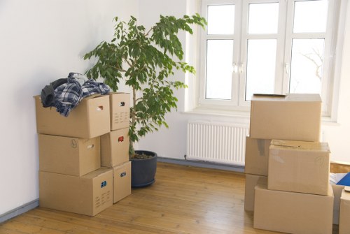 Professional furniture removal team loading items safely