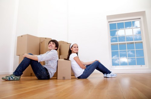 Furniture and boxes prepared for transport by moving truck