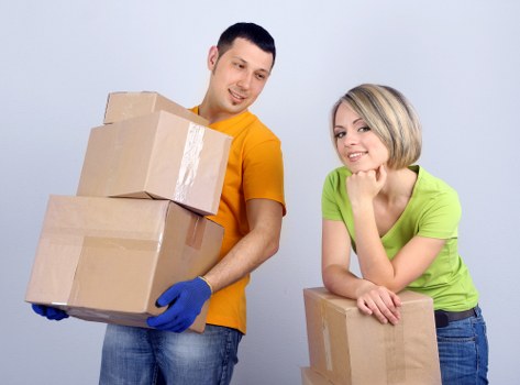Removal van handling furniture near St Johns Wood residential streets
